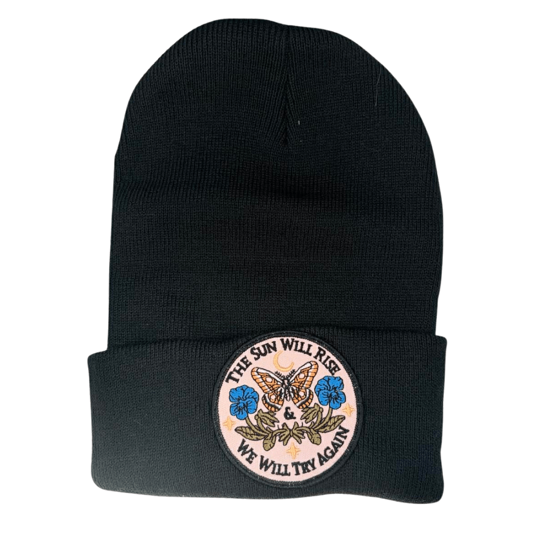 Toque_theSunWillRise_black.png