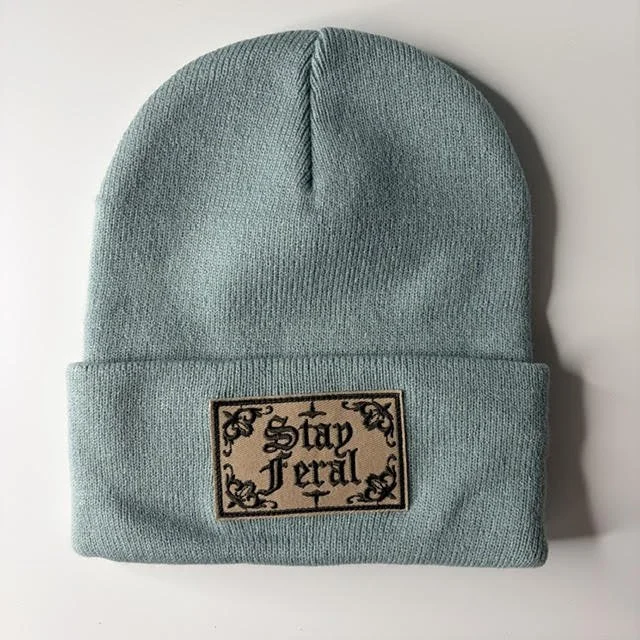 stay feral teal.jpg