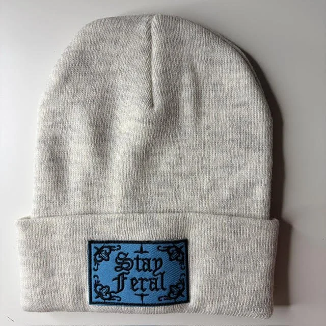 stay feral light greay with blue logo.jpg