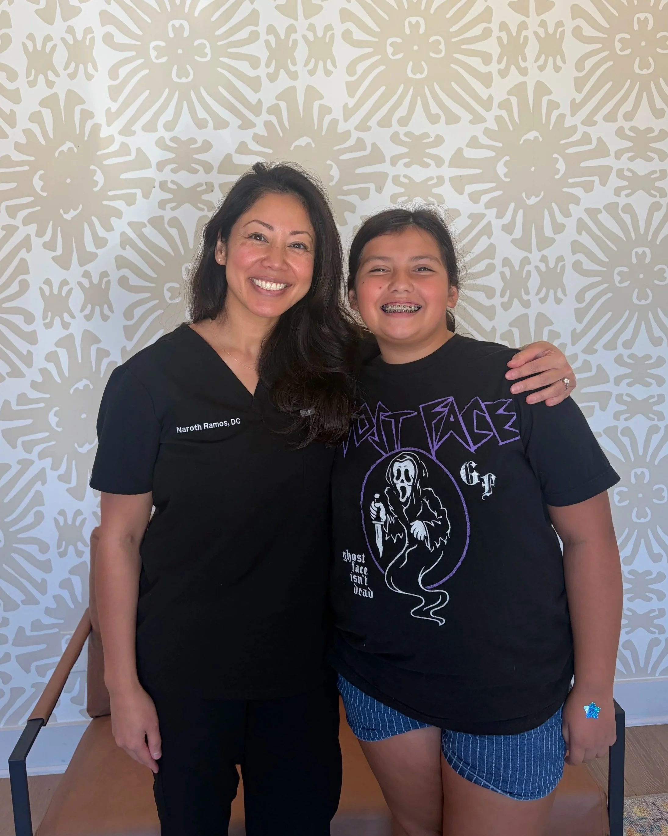 Dr. Naroth Ramos, Dc with a pediatric patient from Back To You Chiropractic.