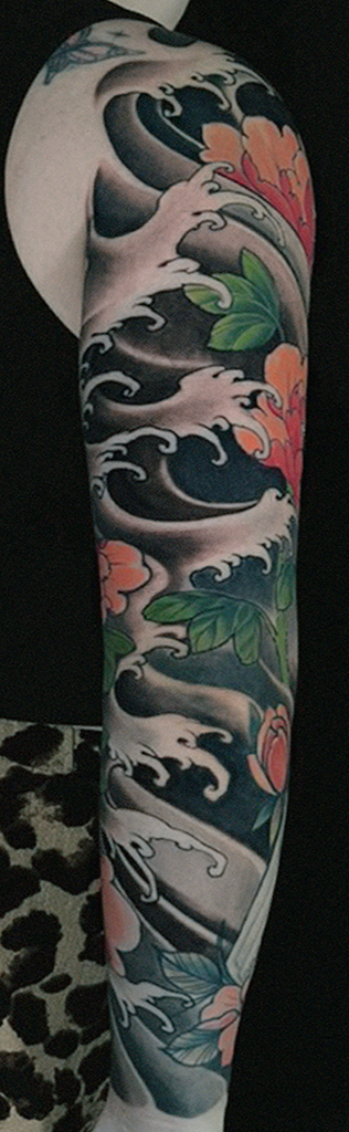 japanese-waves-sleeve-and-flowers-tattoo.png