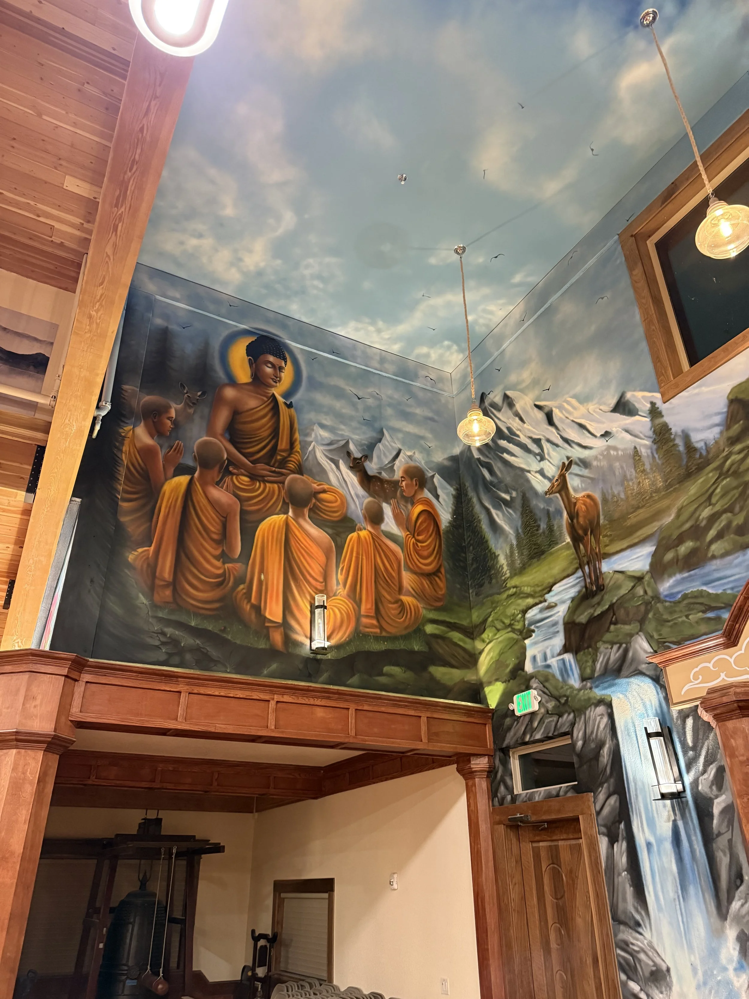 Finished Buddha first sermon and cascading waterfall mural in Monastery hall
