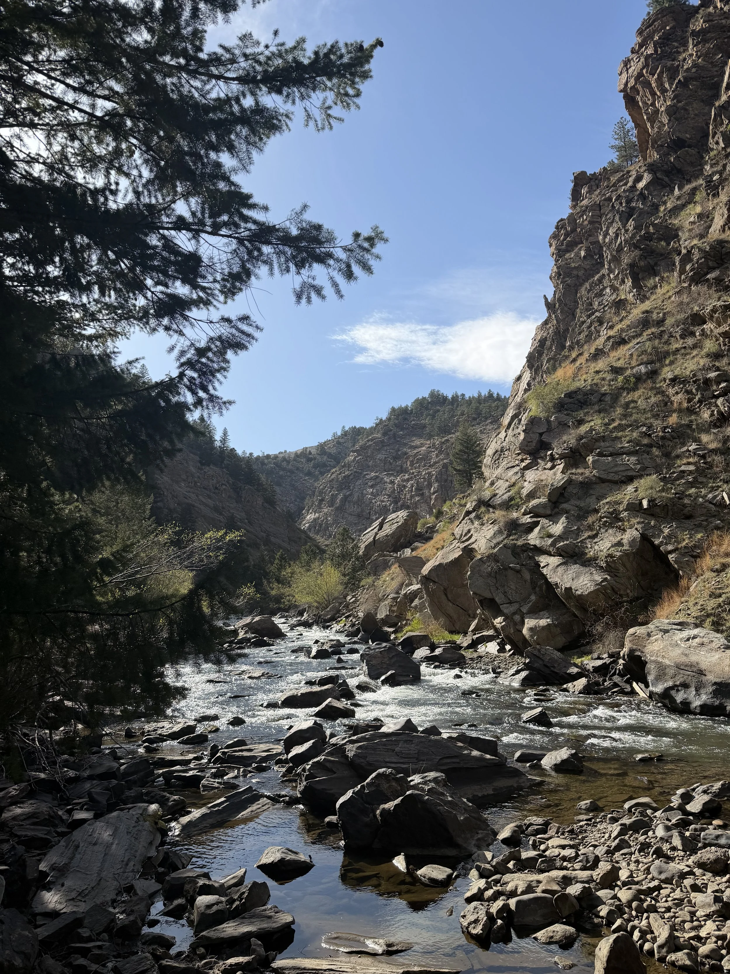 Clear Creek advanced whitewater rapids on a sunny day in Idaho Springs Colorado