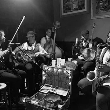 Slick Skillet Serenaders @ Three Muses