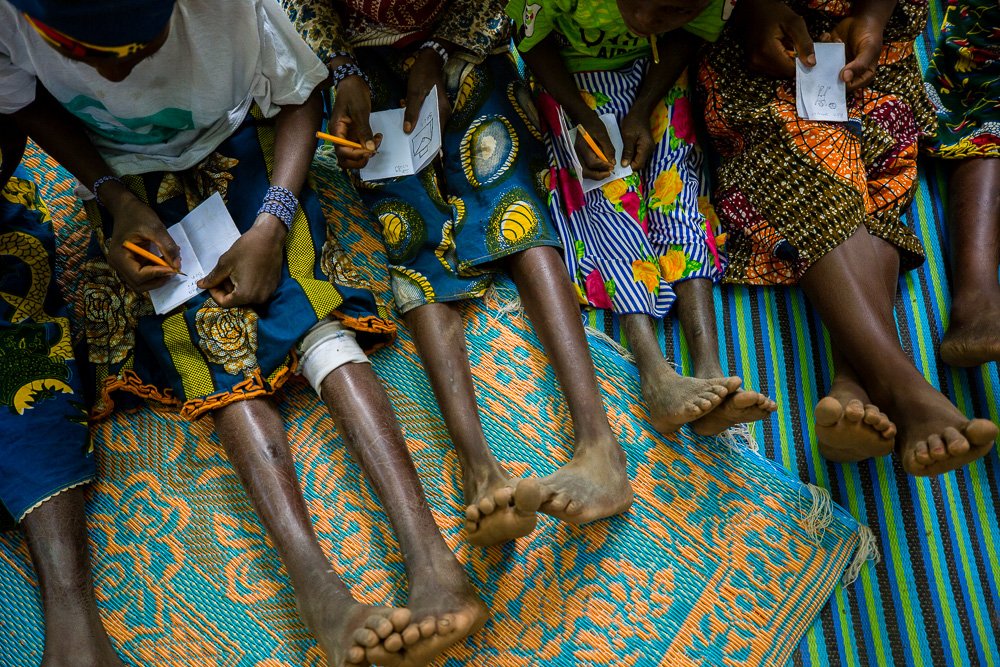 DetailShot_Reading&Writing_LiteracyBoost_SikassoMali_Jan2018_WEB-9978.jpg