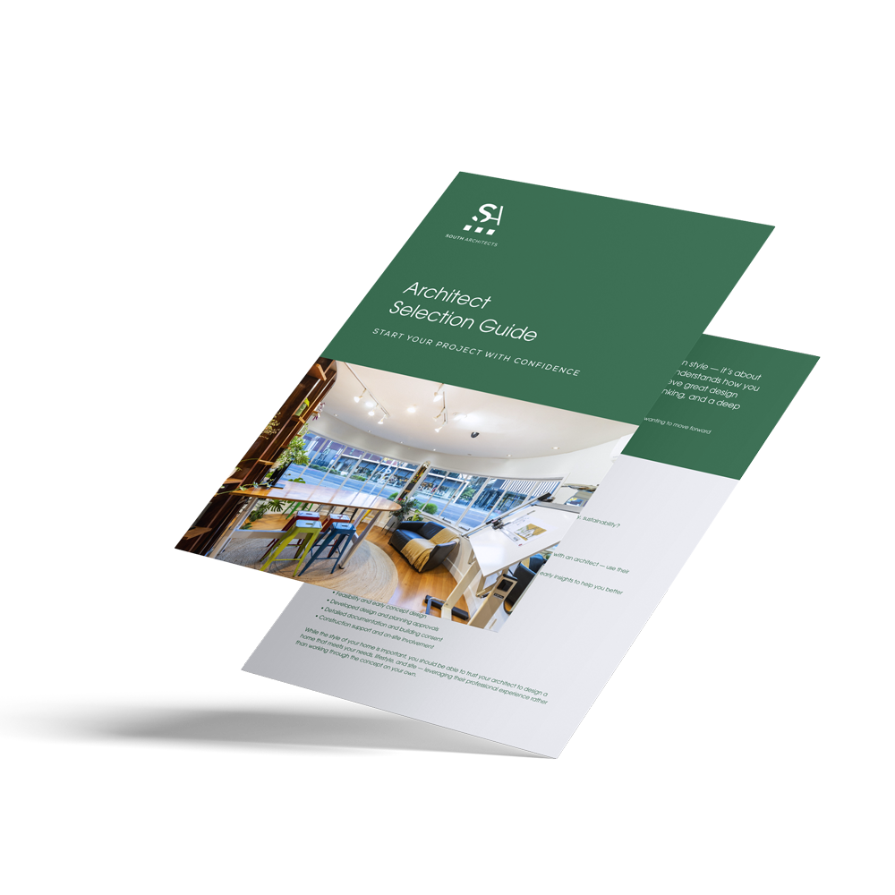 A stack of green and white architectural project selection guides, featuring an interior room with large windows, a table, chairs, and indoor plants.