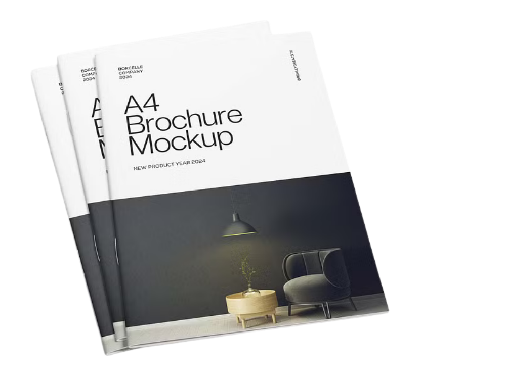 Three mockup brochures with a modern interior scene on the cover featuring a black wall, a hanging lamp, a small table with a plant, and a cushioned chair.