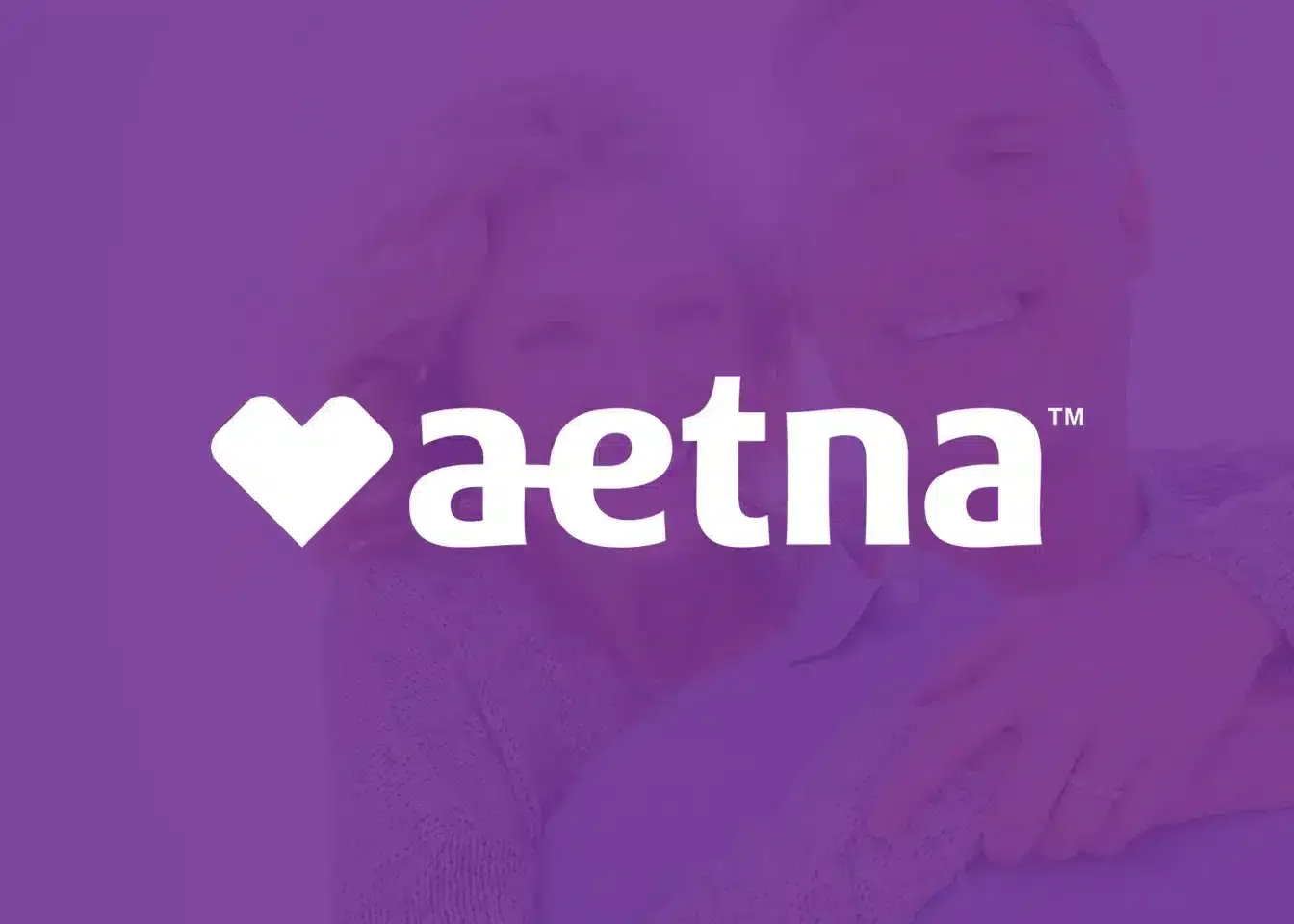 A purple background with the Aetna logo and a faint image of smiling people behind it.