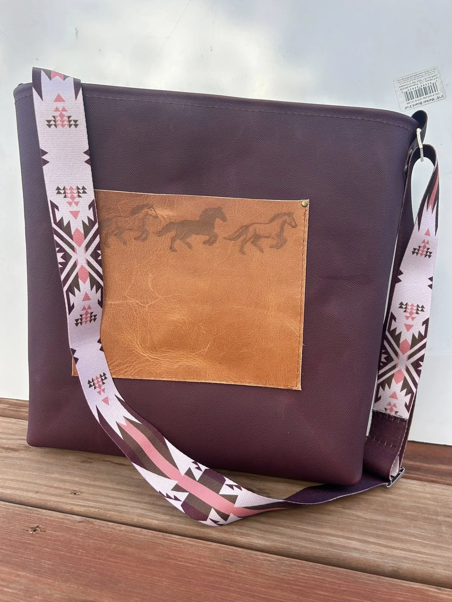 Large tote, burgundy leather with running horse engraved detail and Pendleton strap