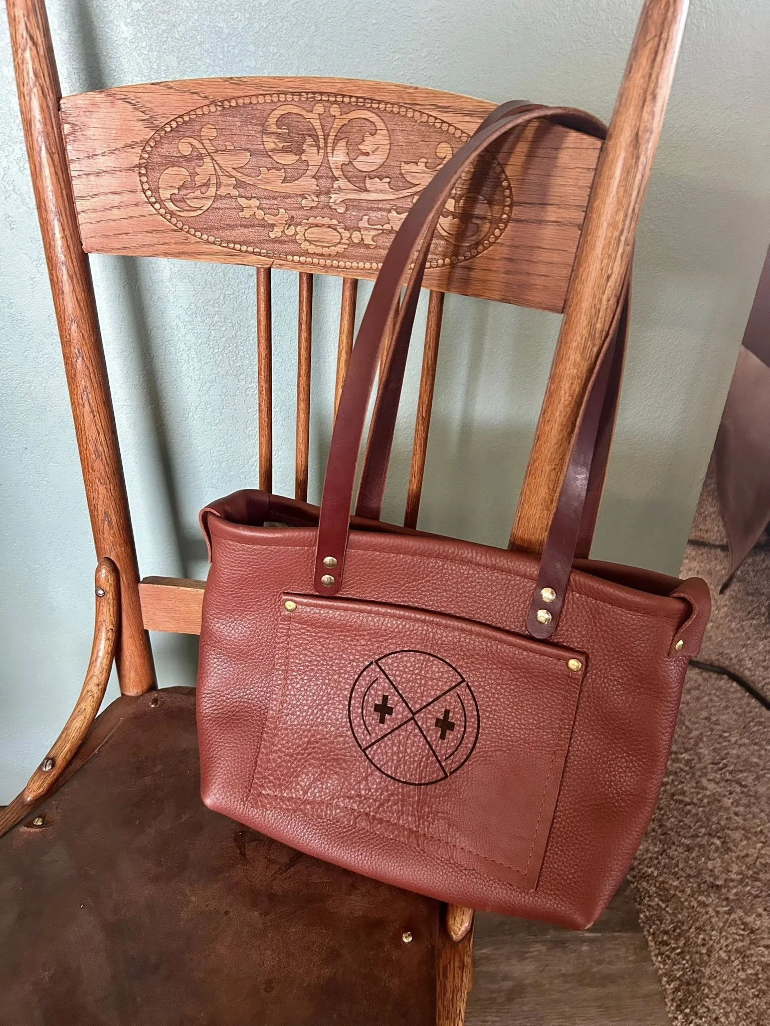 Small tote, brown with engraved detail pocket