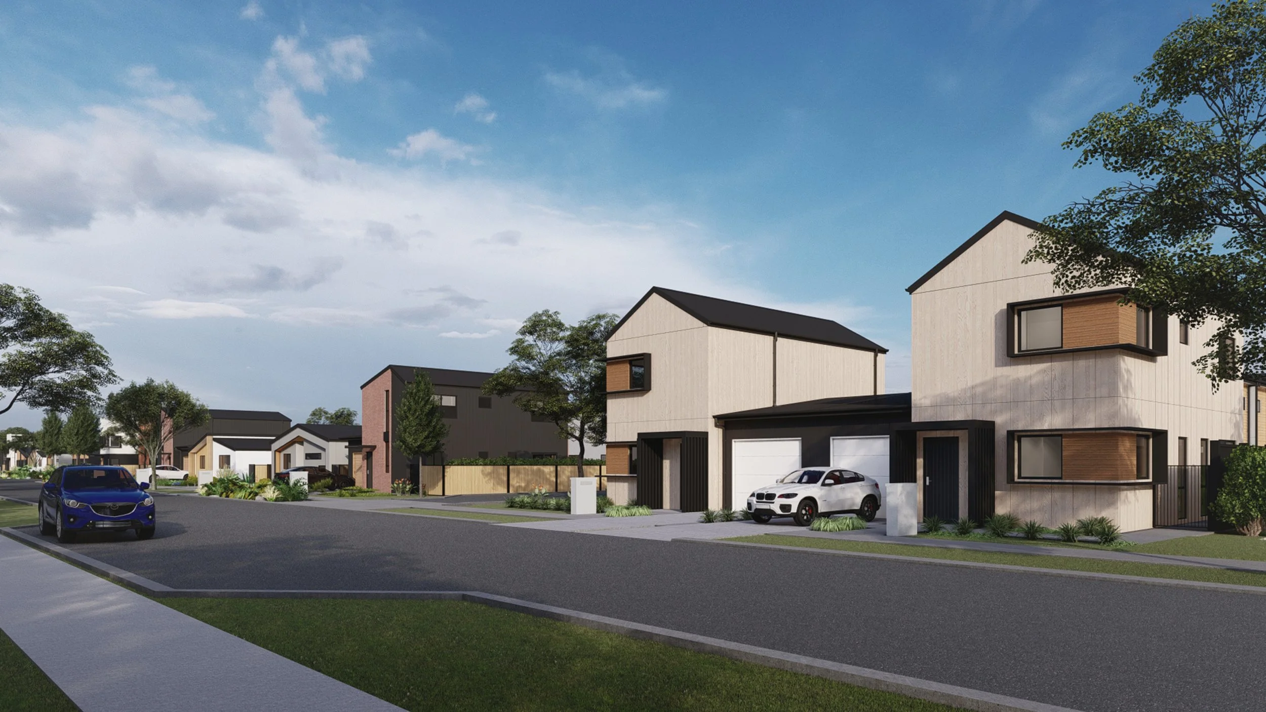A render of The Reserve: First Release's suburban neighbourhood with modern two-story houses, parked cars, trees, and a sidewalk under a partly cloudy sky.