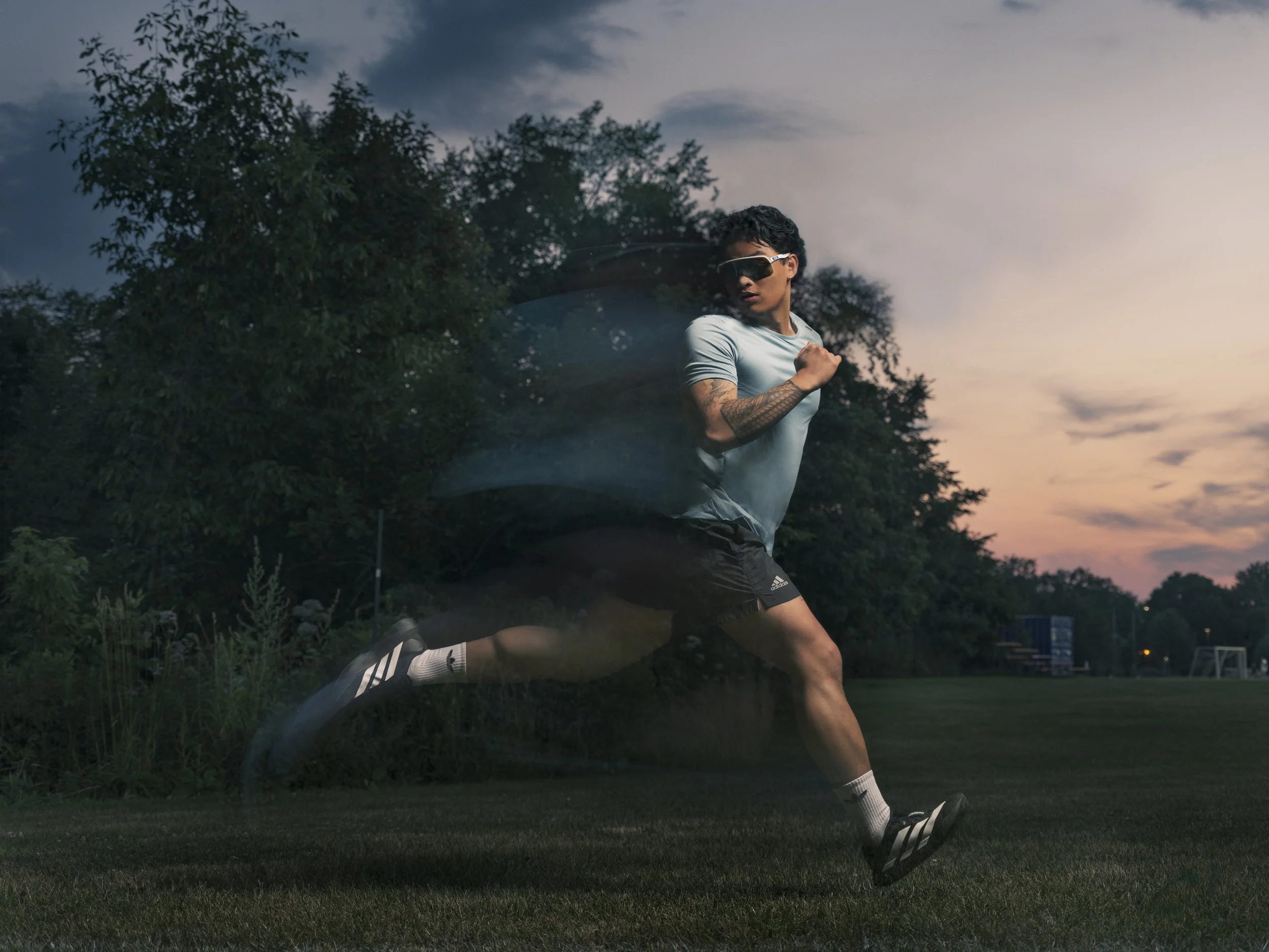Sportswear campaign image with motion blur and warm sunset light
