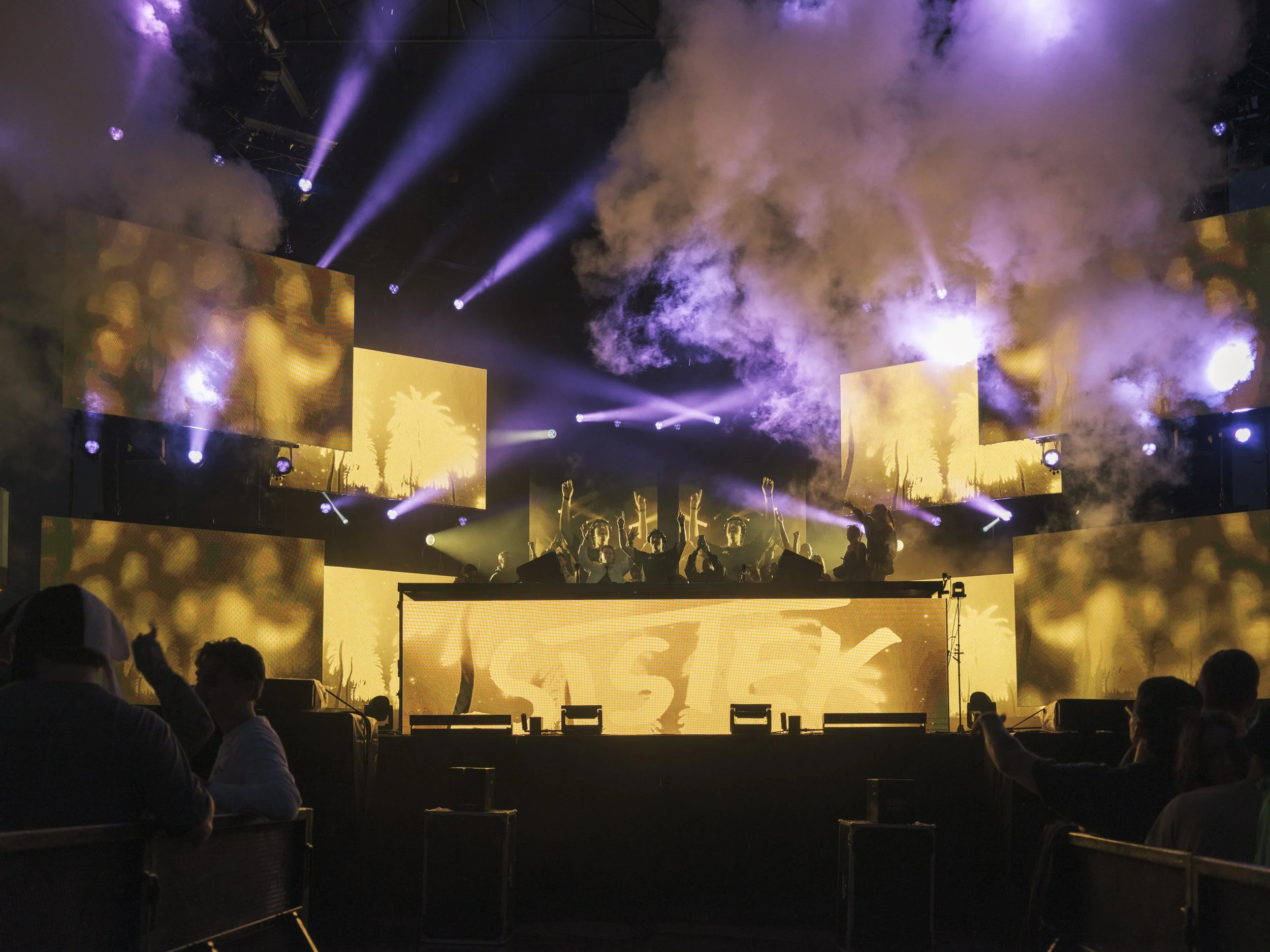 Festival crowd and stage lights during a Montreal live event photographed by Marc Nefaa