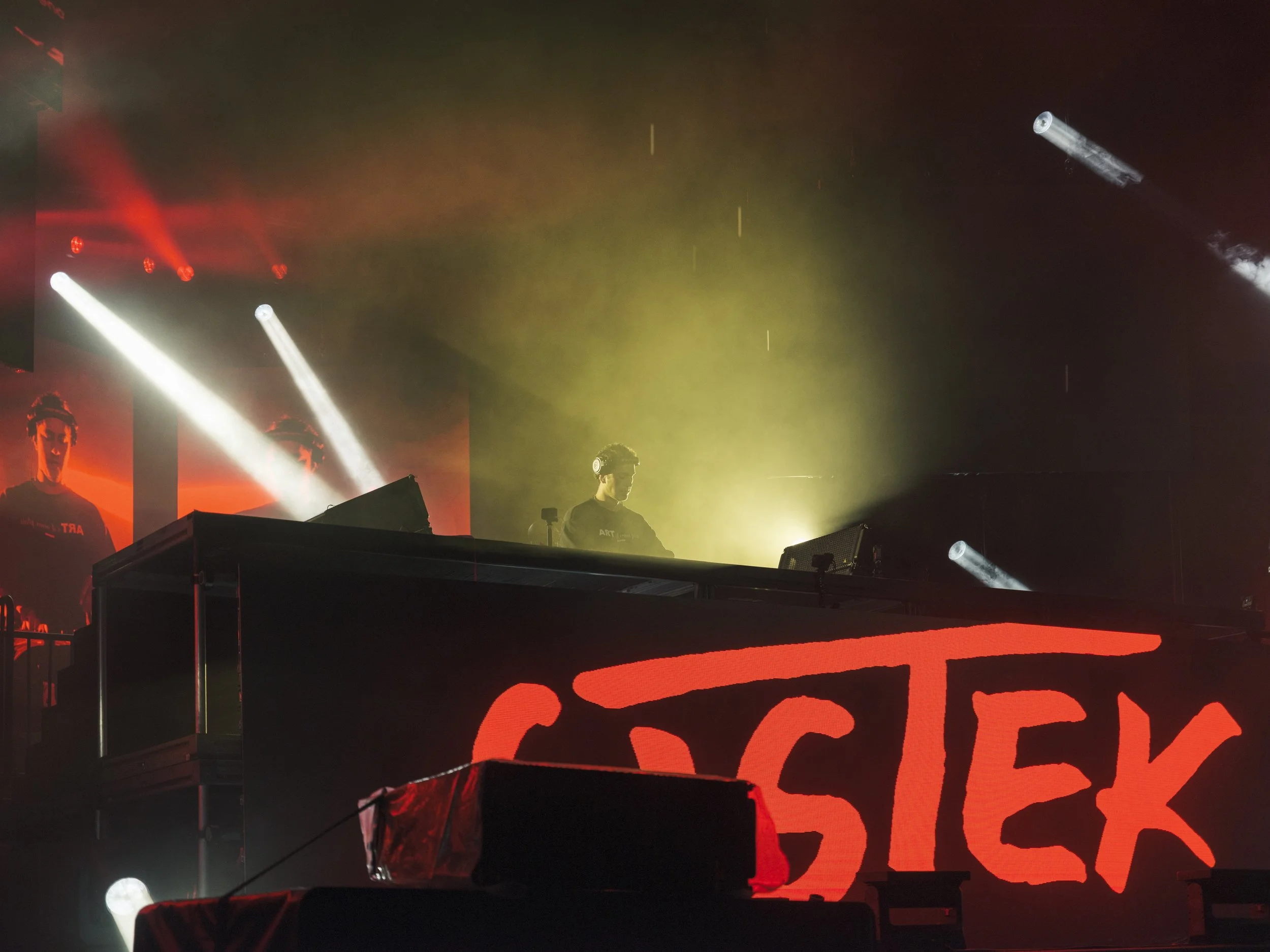 Red stage lighting and crowd atmosphere during Unity Electrofëst festival coverage