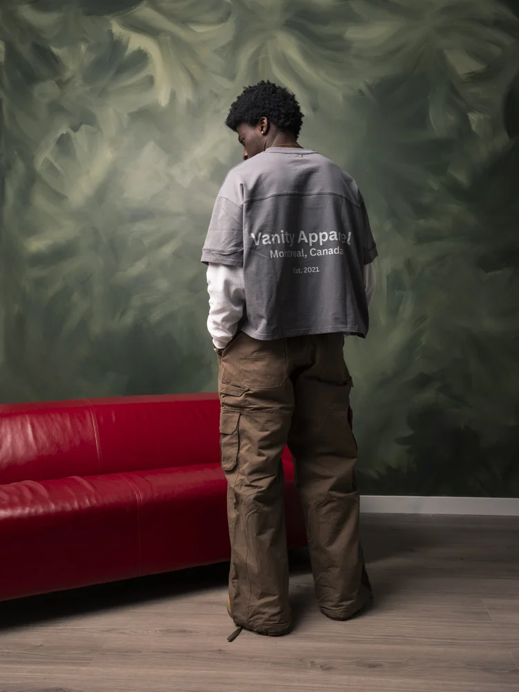 Back-facing studio fashion photography showing garment details for clothing brand campaign