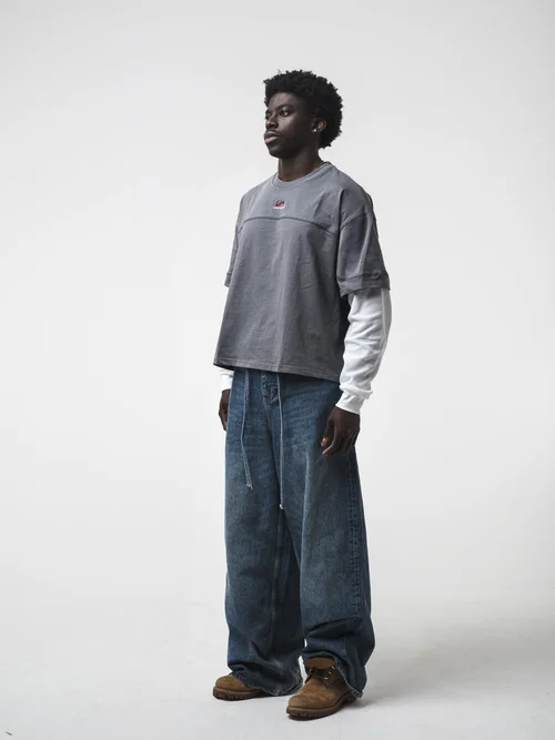 Side view ecommerce photography showing clothing fit and silhouette on white background