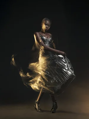 Studio fashion portrait with controlled motion blur