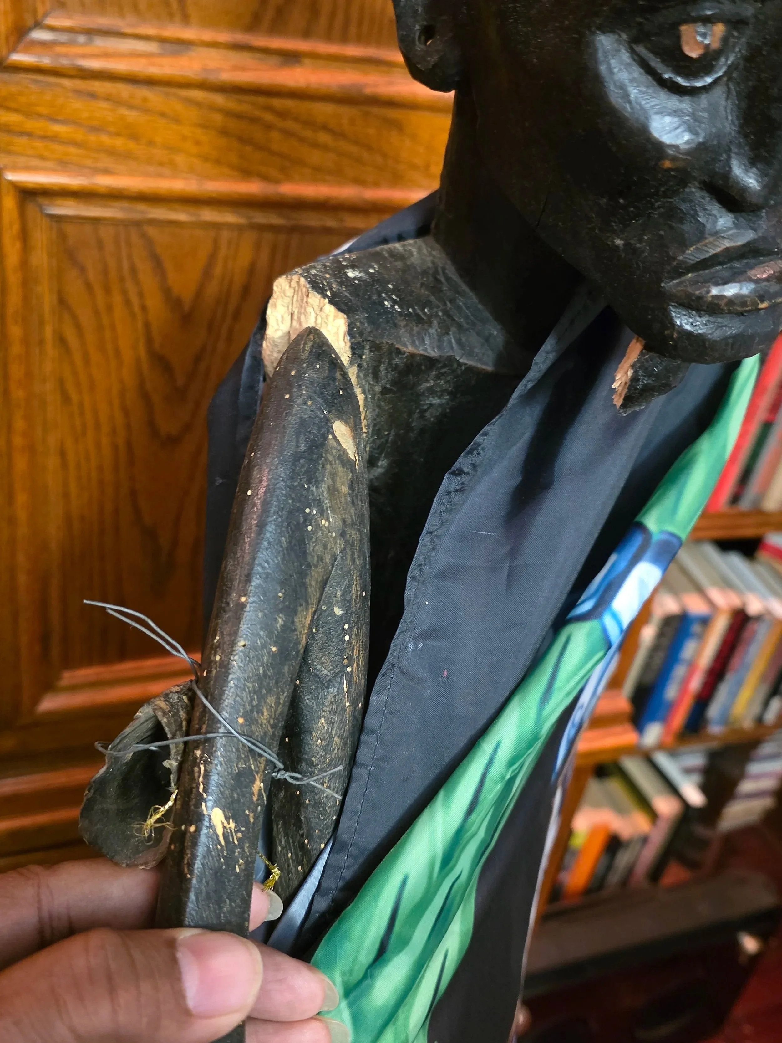 West African Statue with detached arm and hand