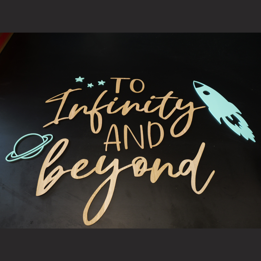 To infinity and beyond timber wall script with mint rocket, planet and stars
