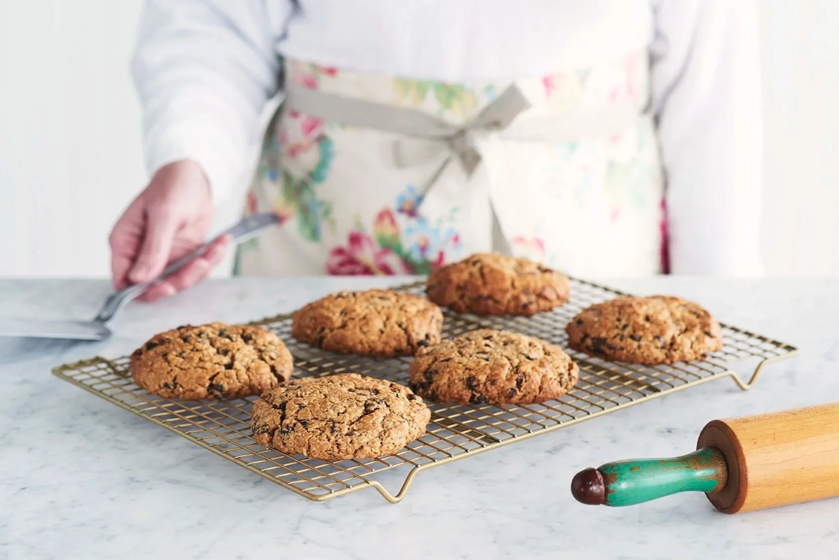 Freshly baked cookies set on a cooling rack