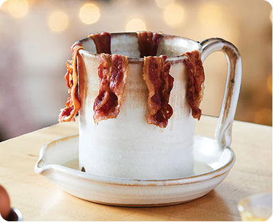 Closeup of Bacon Cooker in Flowering Dogwood Glaze with bacon