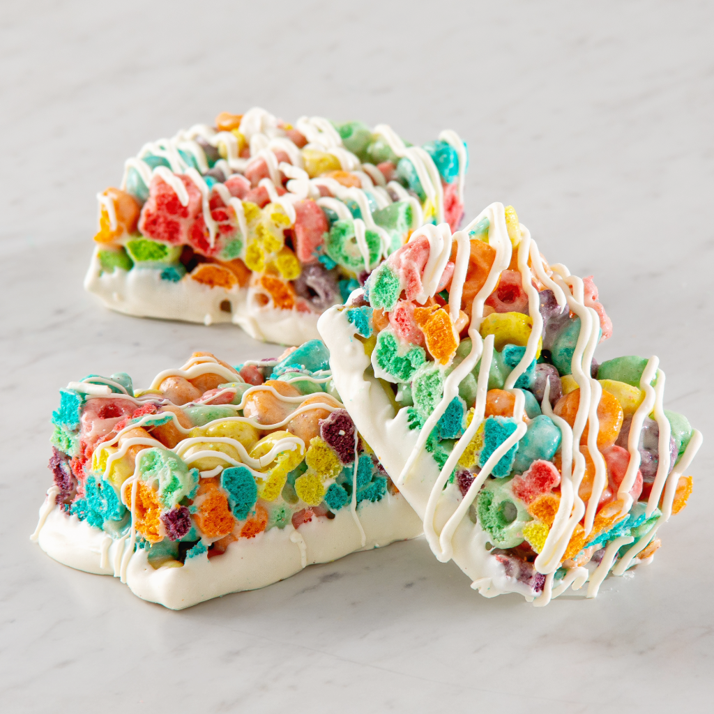 Sweet, sticky cereal treats drizzled with white chocolate