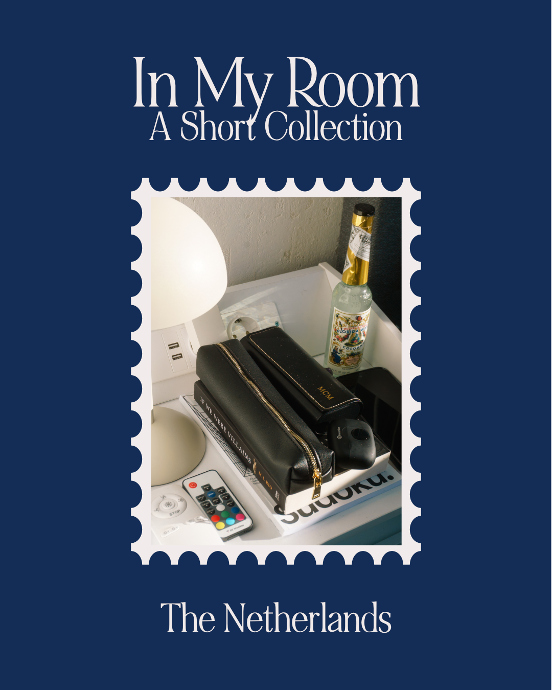 Postzegel met afbeelding van een nachtkastje staat met een lamp, een flesje met een etiket, een zwart portemonnee, een zwart zakje en een afstandsbediening met de titel 'In My Room: A Short Collection'.