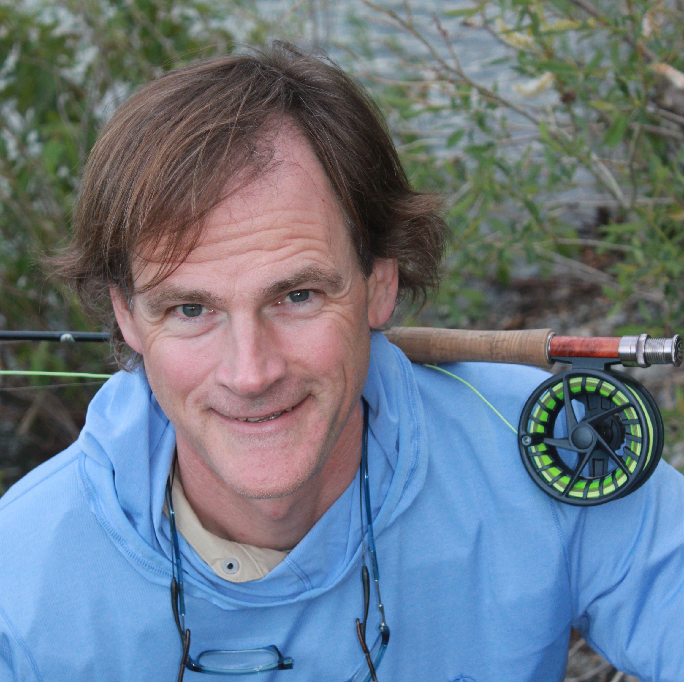 Your fishing guide, looking comfortable on the banks of the Bow River.