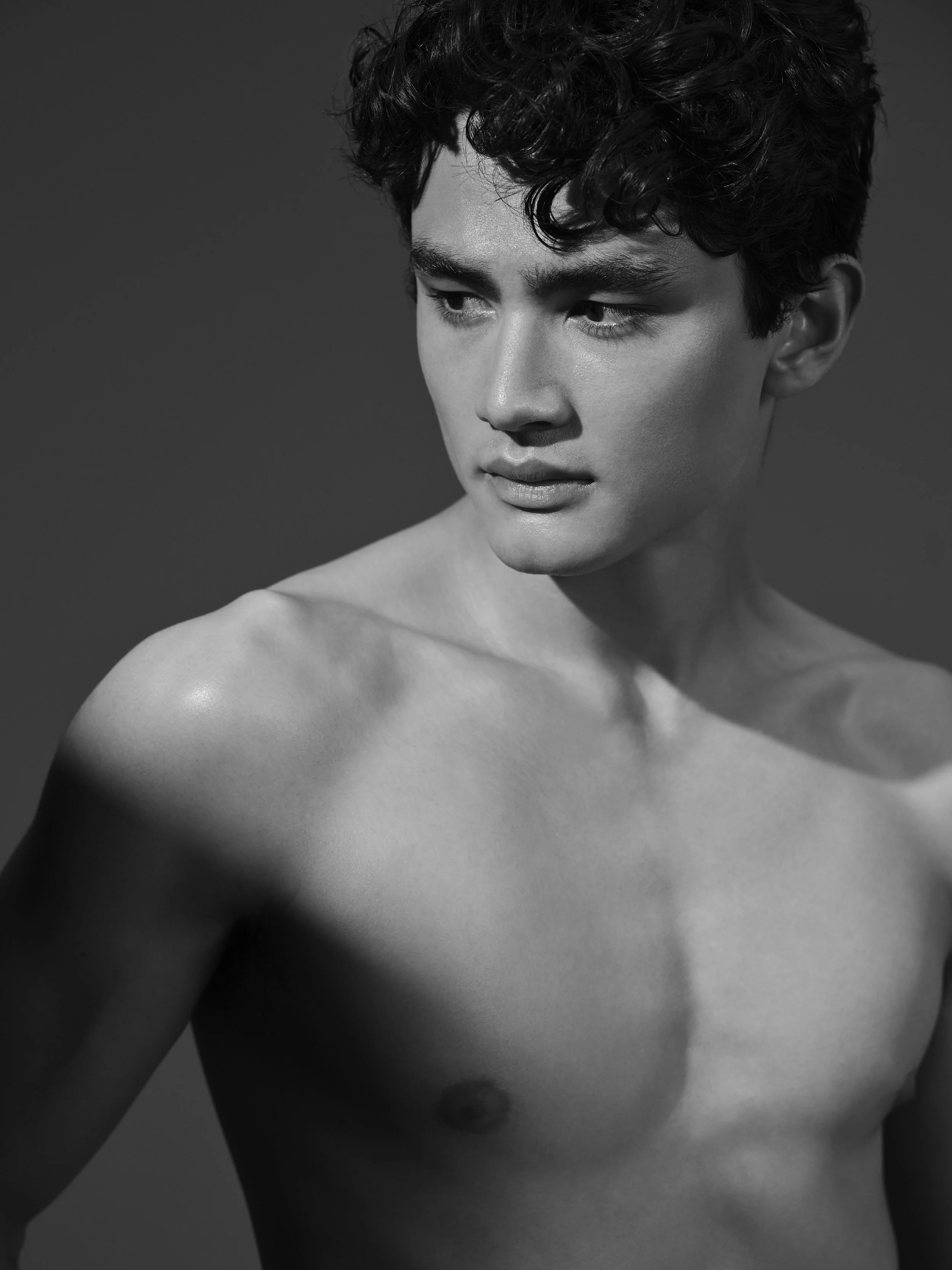 A black and white beauty portrait of a male model
