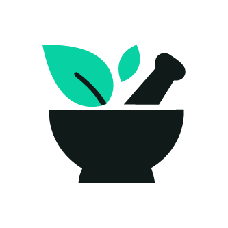 A black mortar and pestle with green leaves and a black spoon inside.