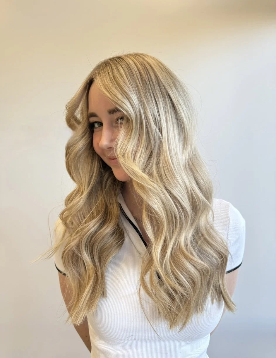 Long blonde hair styling at Solie the Space Petrie