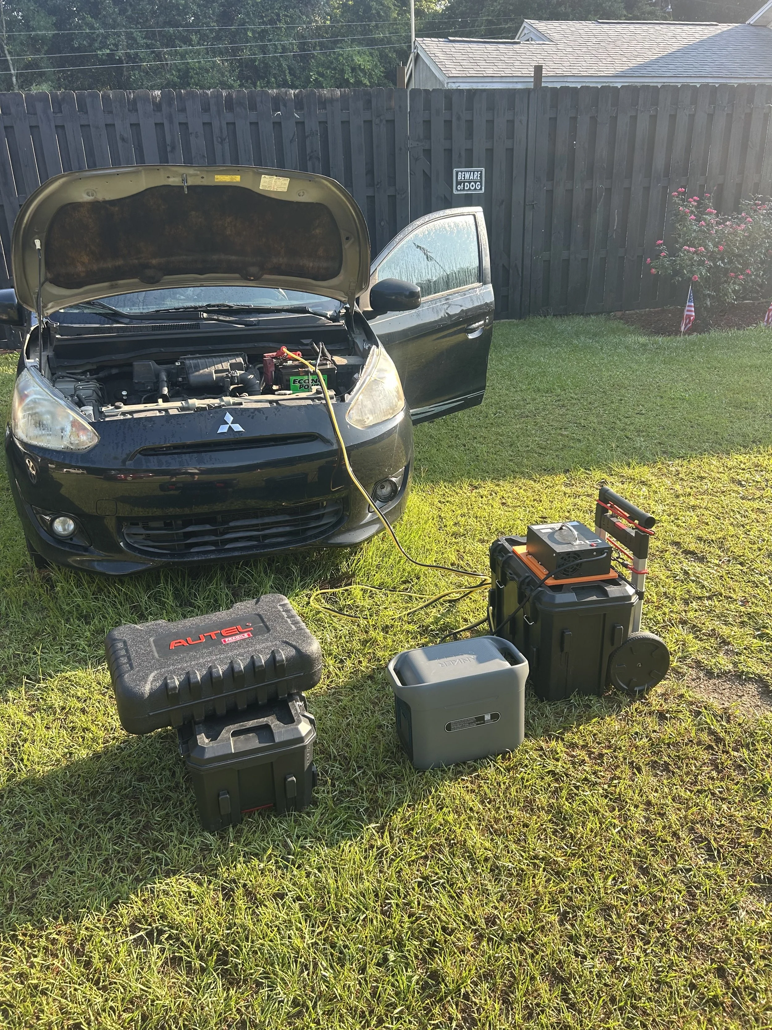 2014 Mitsubishi Mirage all keys lost mobile locksmith service in Pensacola, Florida. New key cut and programmed on-site using professional Autel key programming equipment.