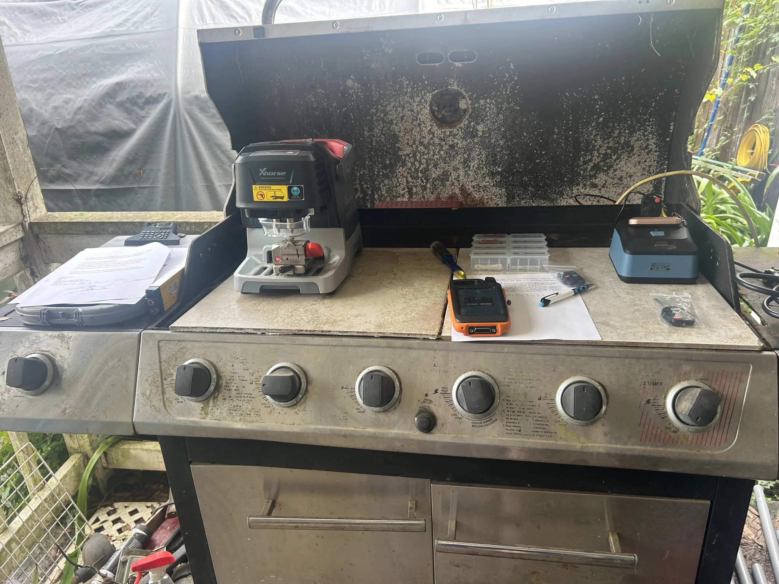 My key cutter set up on my workstation/old BBQ pensacola Florida Add key and remotes ford focus 2012 Stephen Serven Key Fob & Auto Lock