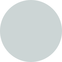 A plain, light gray circle against a black background.