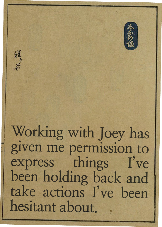 A printed quote on beige paper that reads, "Working with Joey has given me permission to express things I’ve been holding back and take actions I’ve been hesitant about." There is Japanese writing in a blue oval at the top right corner and handwritten Japanese characters on the left side.
