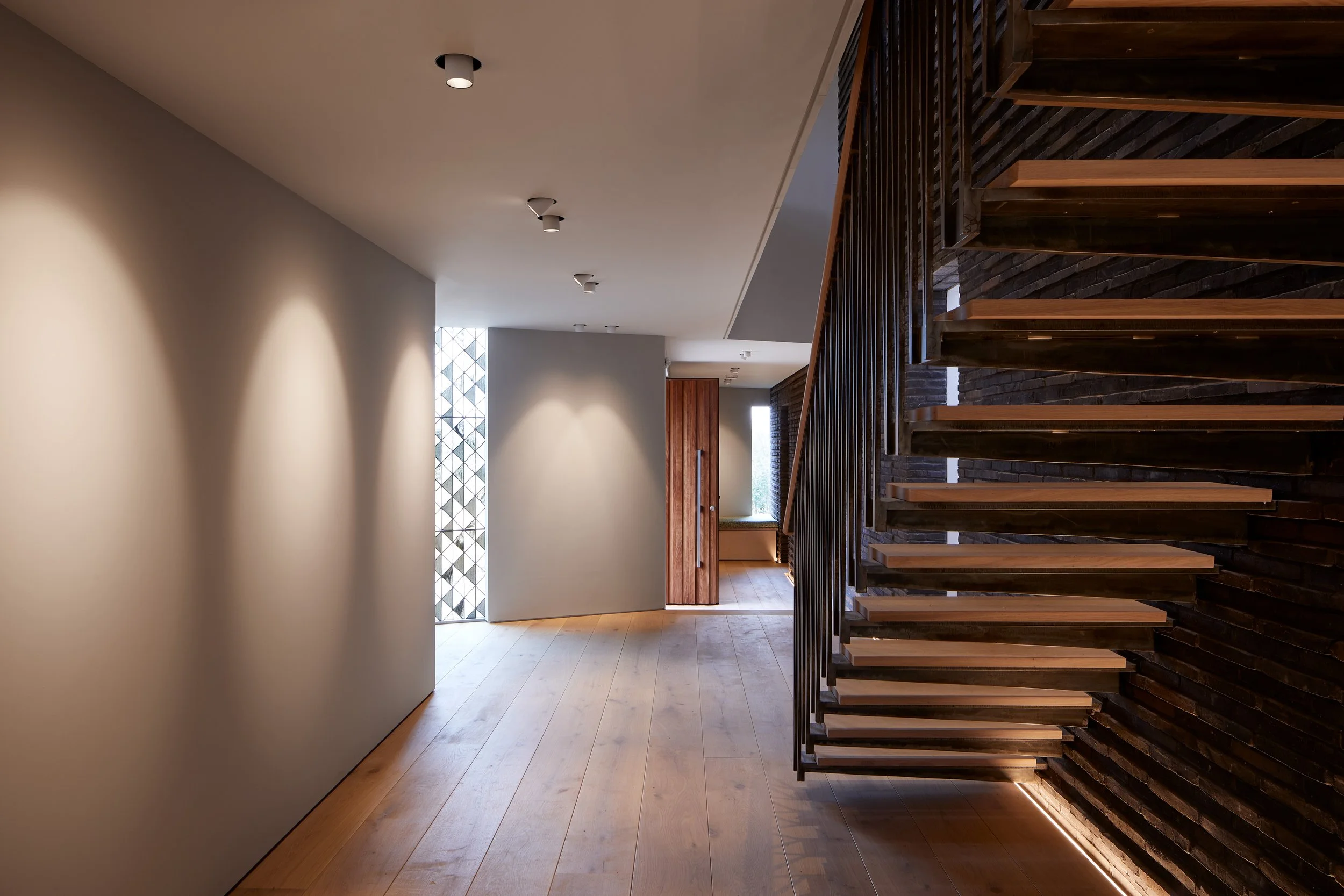 An image of lighting on stairway and corridor