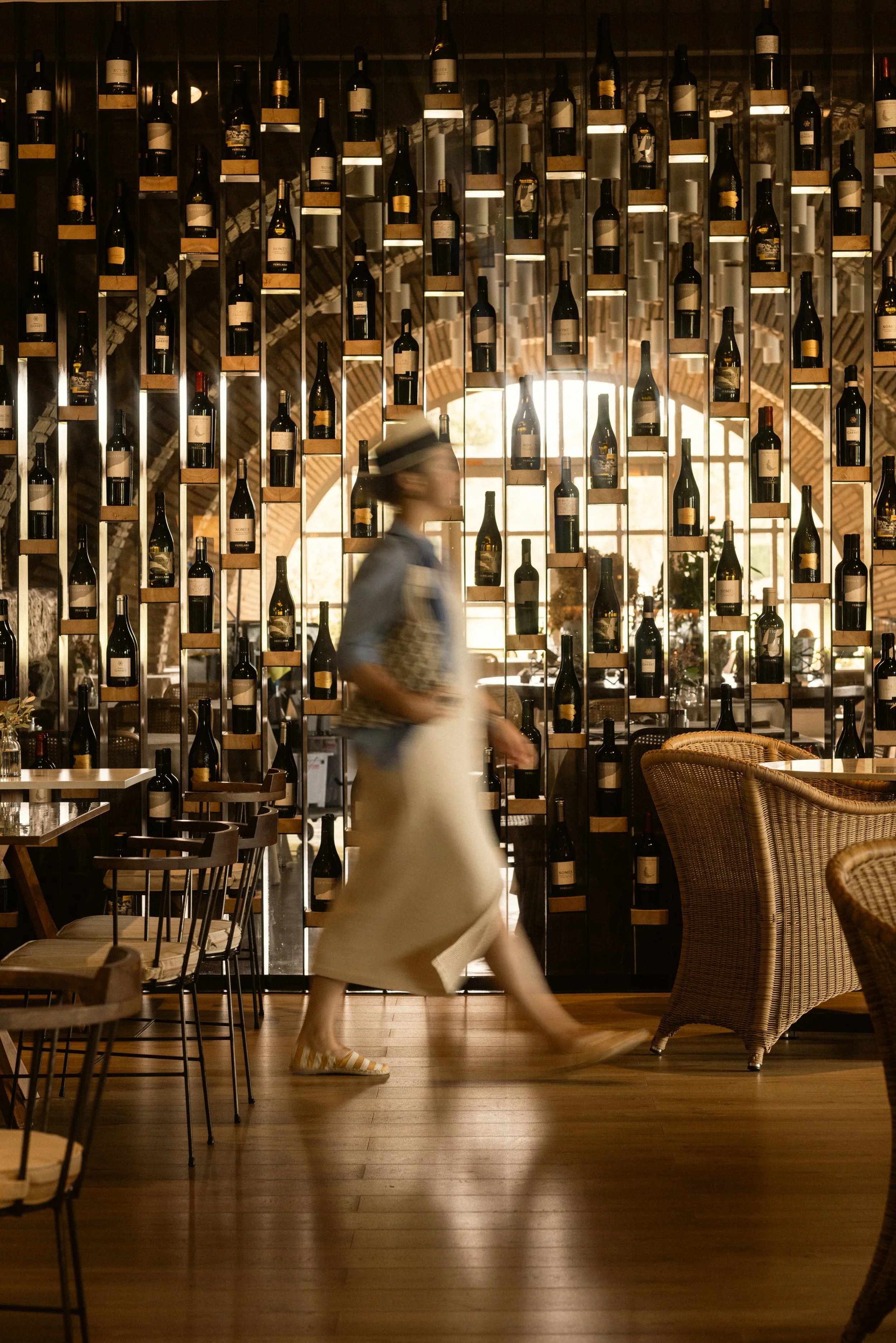 Exquisite wine collection at Hotel Perelada: a curated display of local vintages in a luxury restaurant interior.