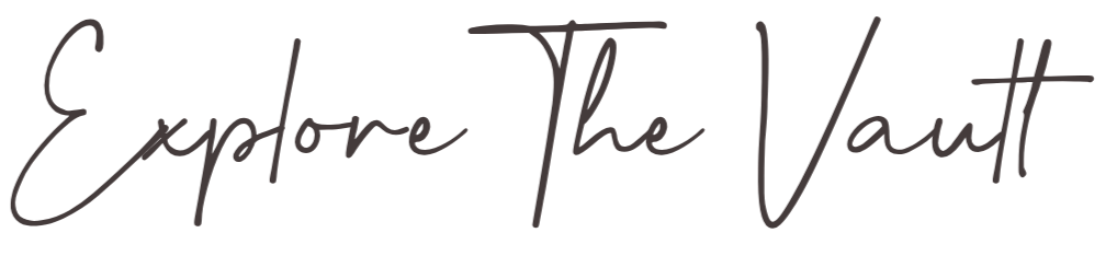 Text that reads 'Explore The Vault' in a cursive font on a transparent background.