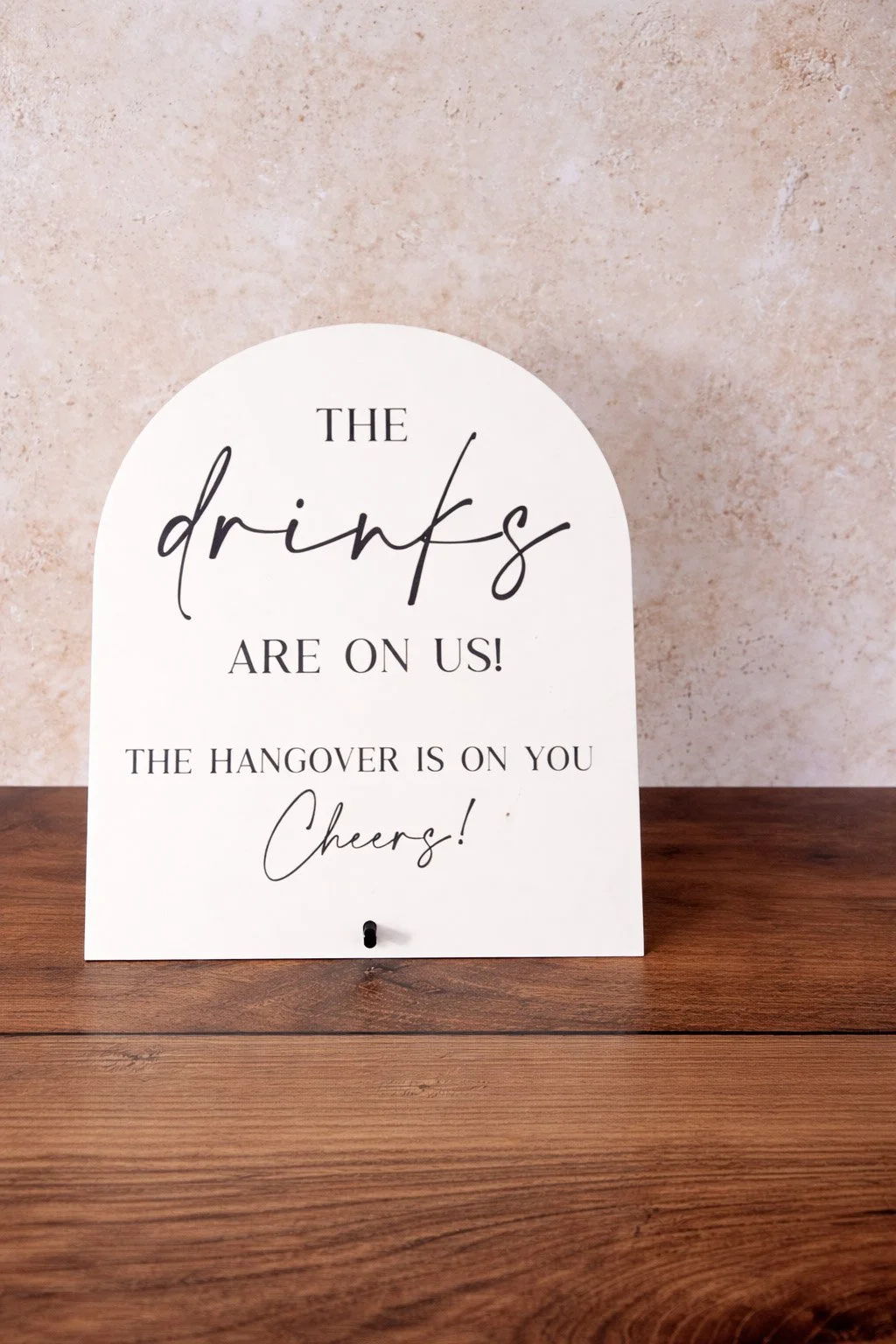 The Drinks Are On Us Sign
