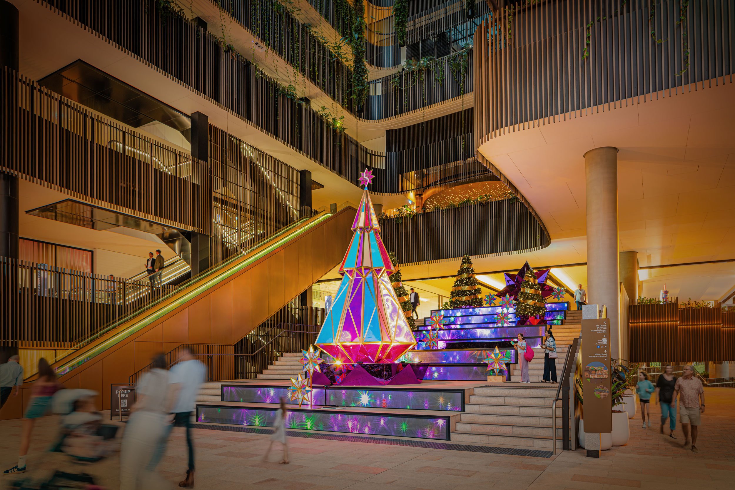 The Star Brisbane decorated for Christmas with colourful illuminated Christmas trees and ornaments.