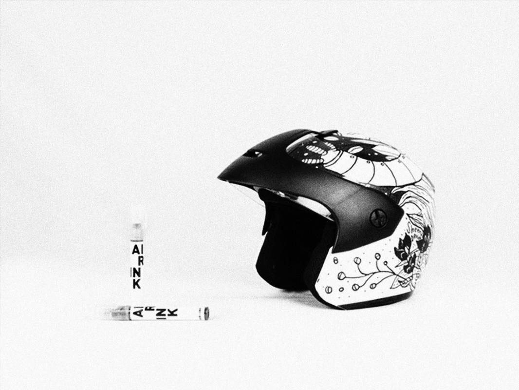 ink and crash helmet
