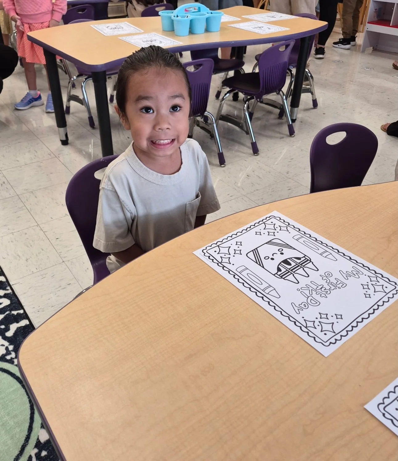 Preschool child developing social and emotional skills in a classroom environment