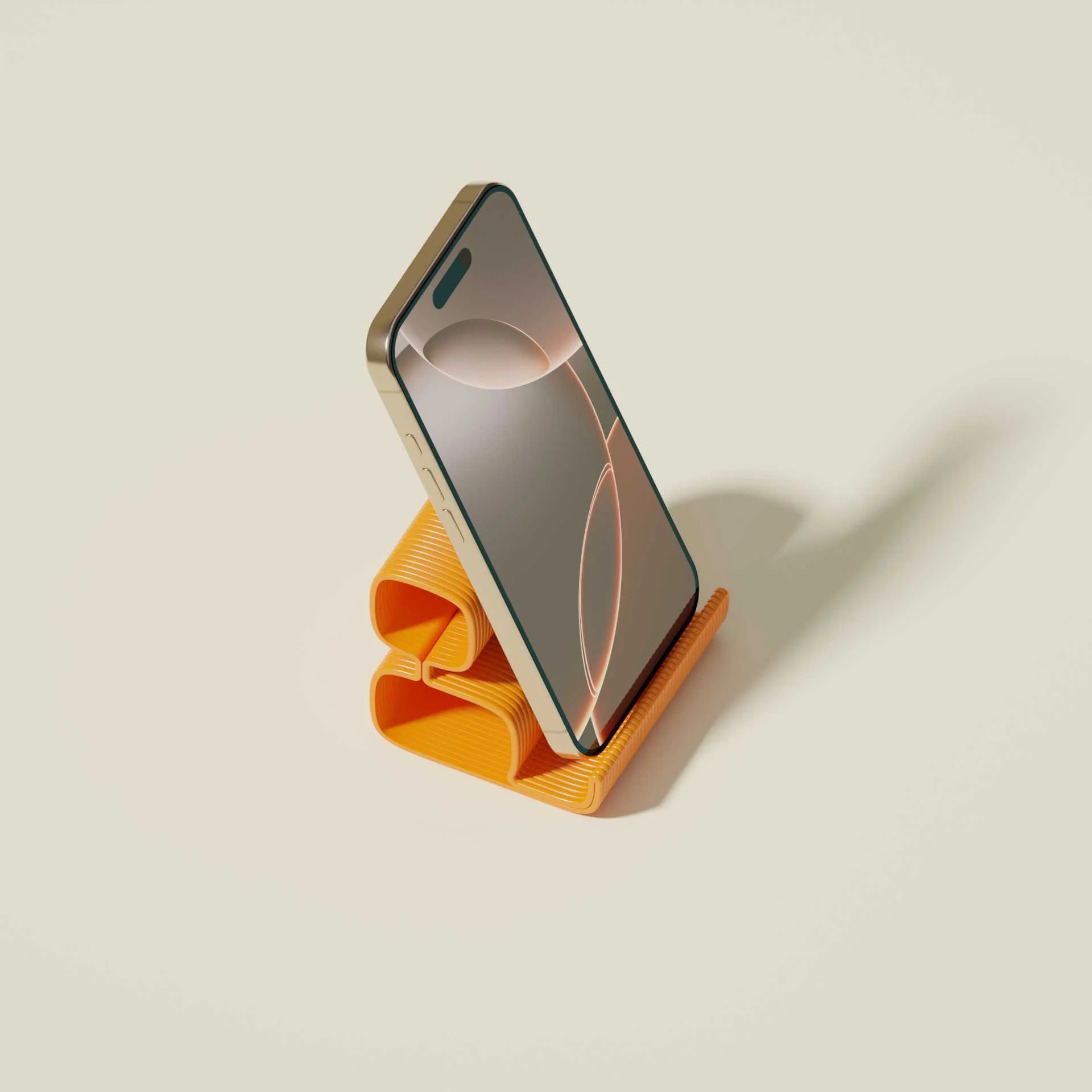 A smartphone resting on an orange, artistic mobile stand with a textured design, set on a plain, cream-colored surface.