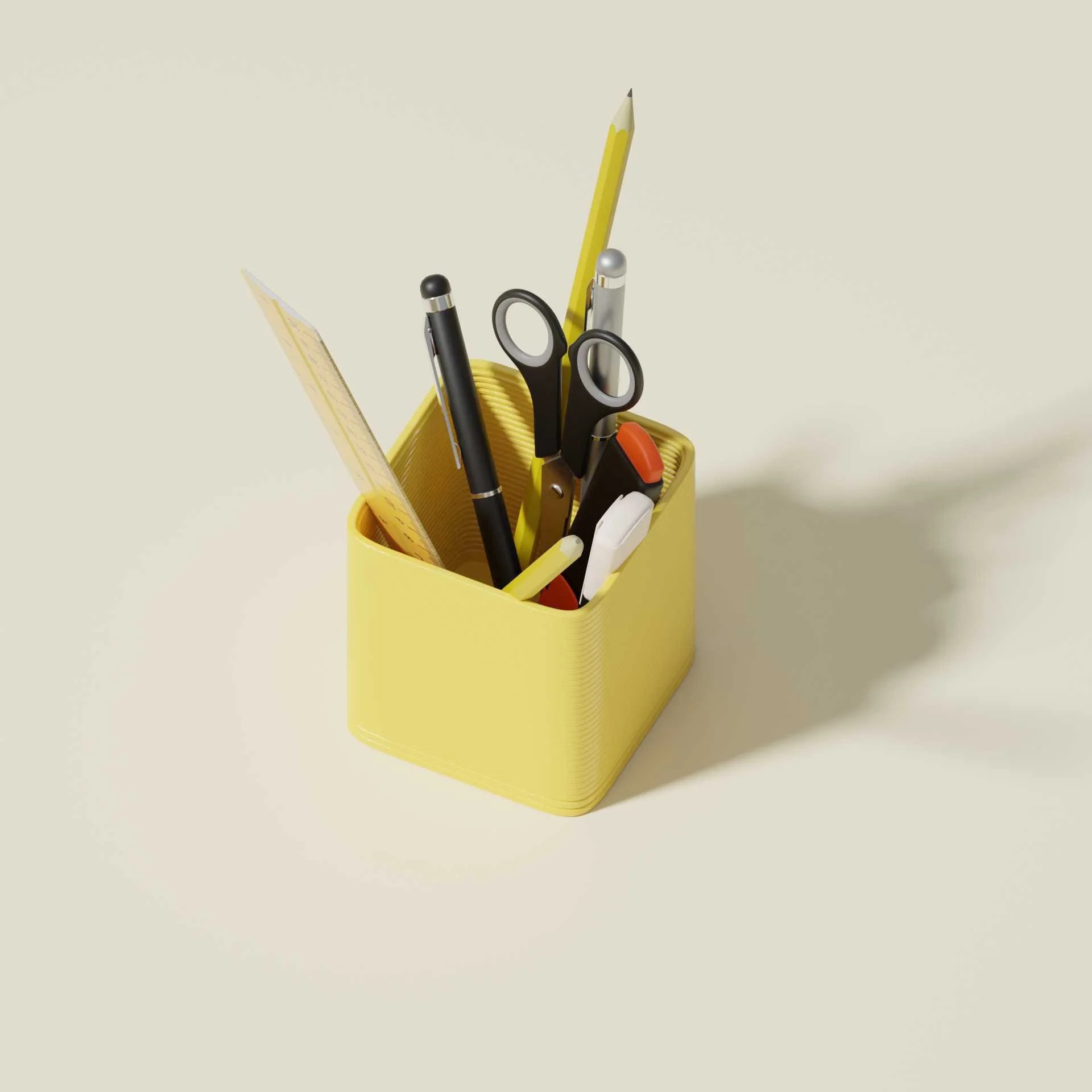 Yellow desk organizer holding scissors, pens, a pencil, a ruler, and a stapler, on a white surface.