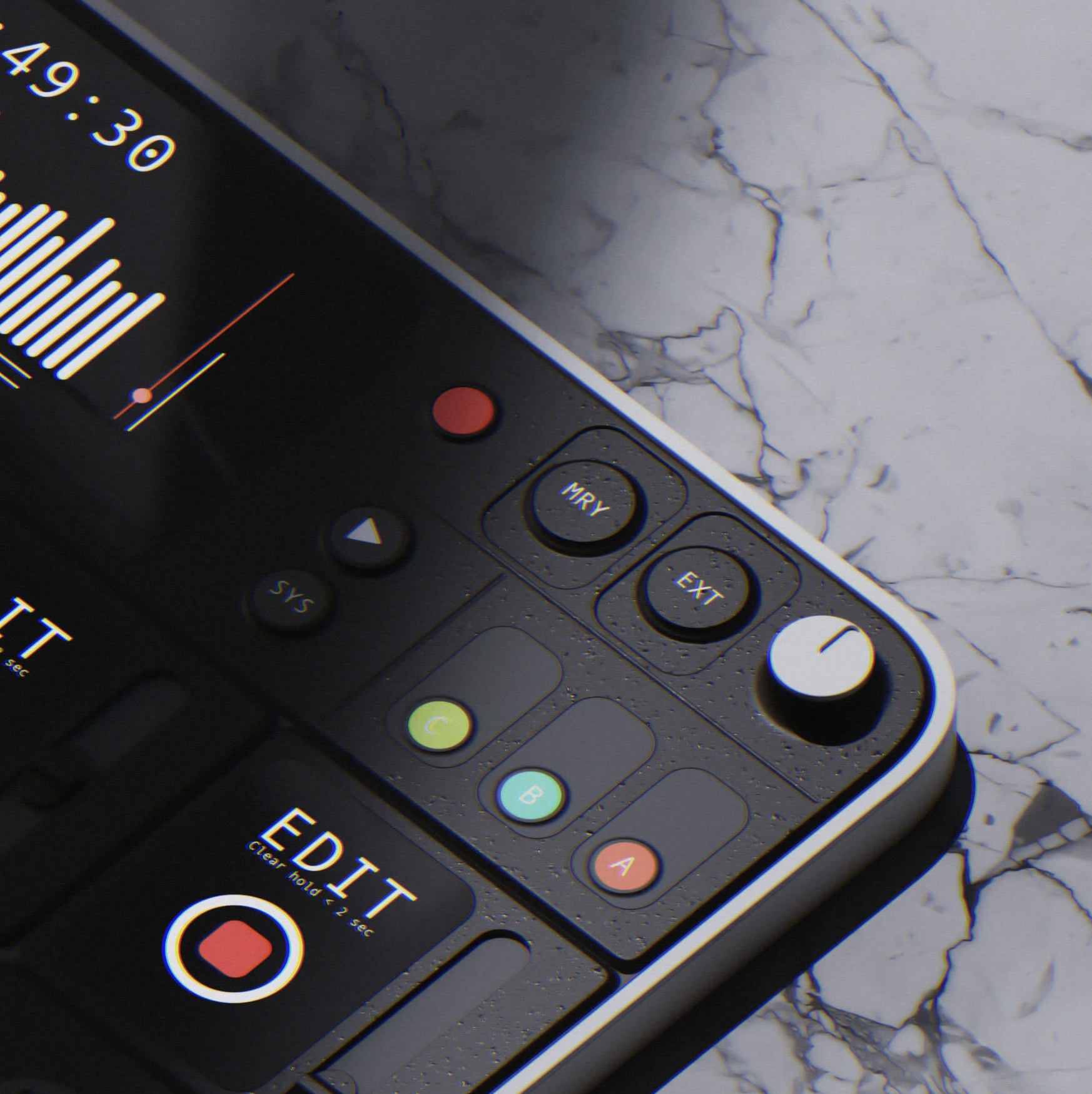 Close-up of a professional video camera's control panel with buttons labeled MRAY, EXT, C, B, A, and a red record button, resting on a white marble surface.