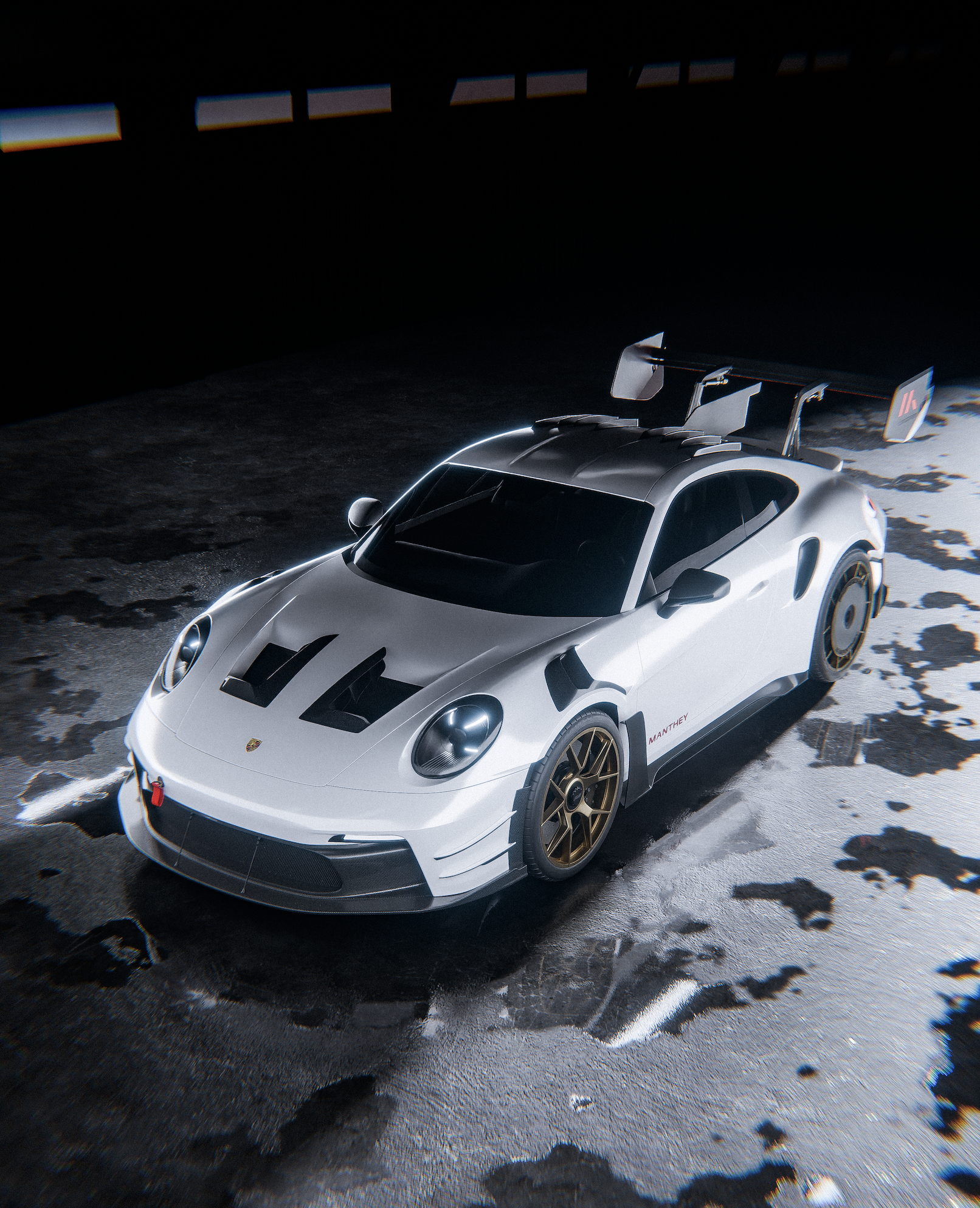 A white race car with black accents and a large rear wing, parked on reflective ground with puddles, under a dark overhead structure.