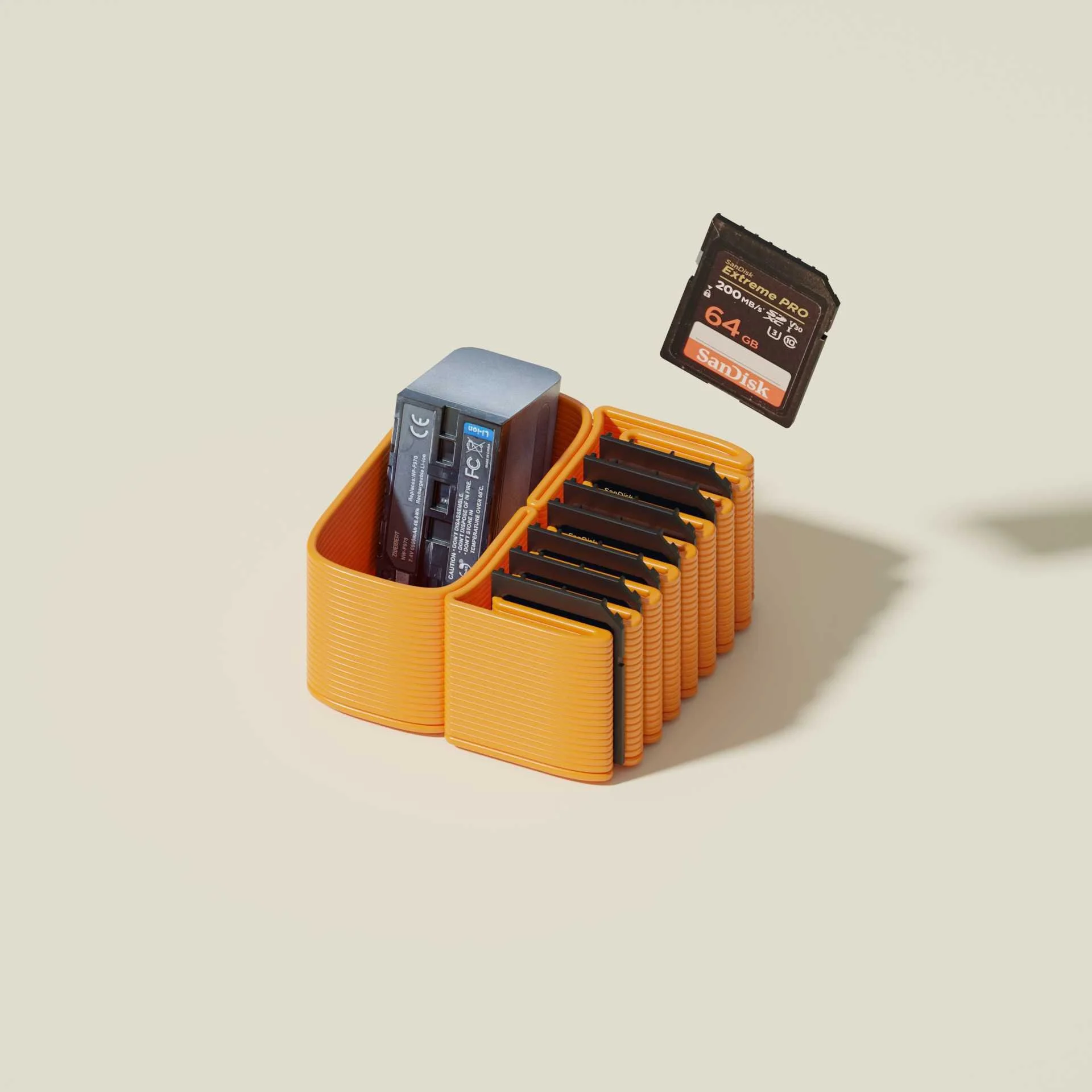 Orange plastic organizer holding a camera battery charger and multiple black memory cards, with a SanDisk 64GB SD card mid-air.
