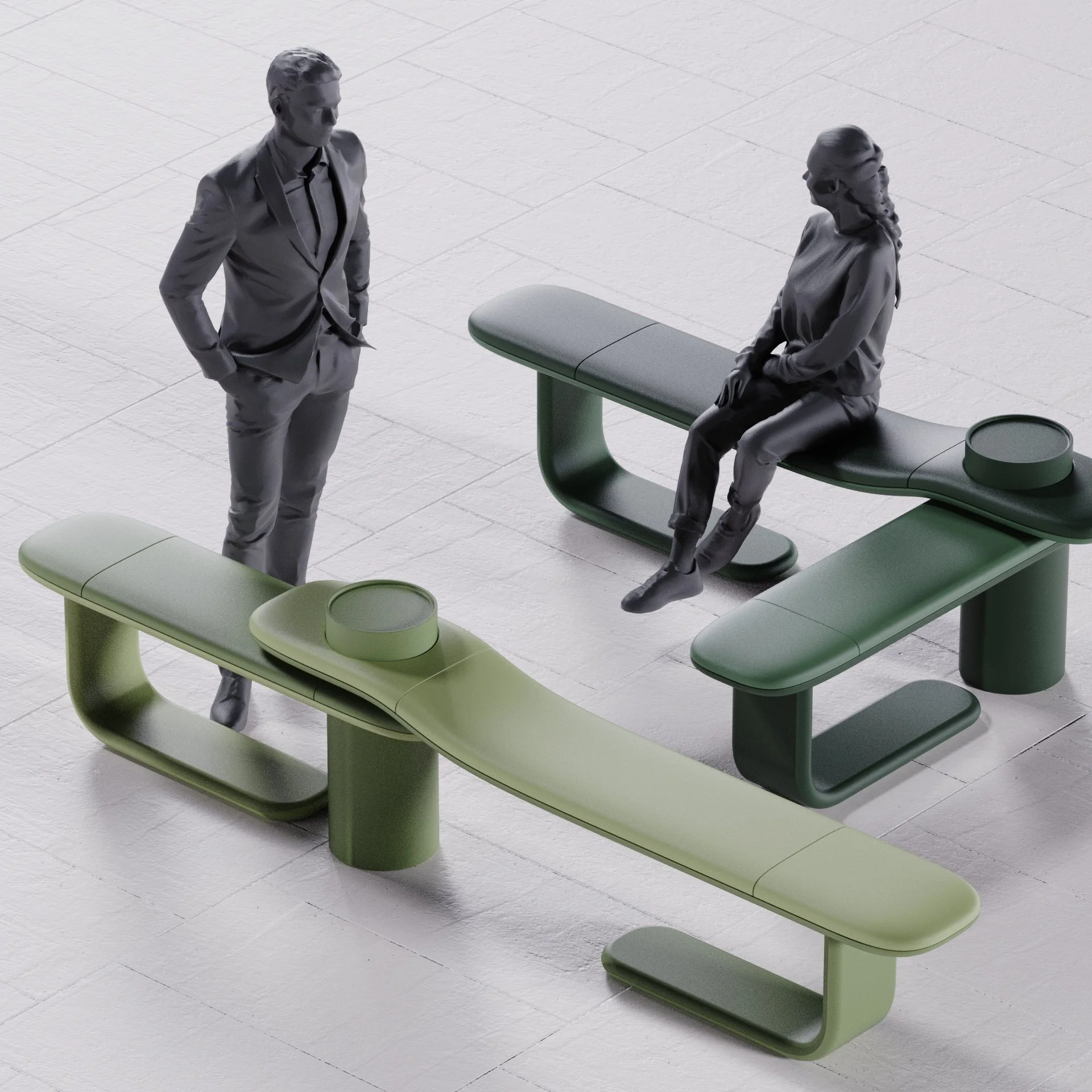 Two monochrome statues, a man and a woman, in a modern, abstract setting with curved green benches and circular trays, on a tiled floor.