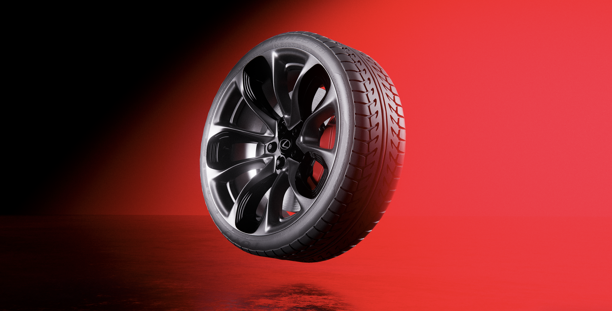 A black car tire with a black rim, floating against a red and black gradient background.