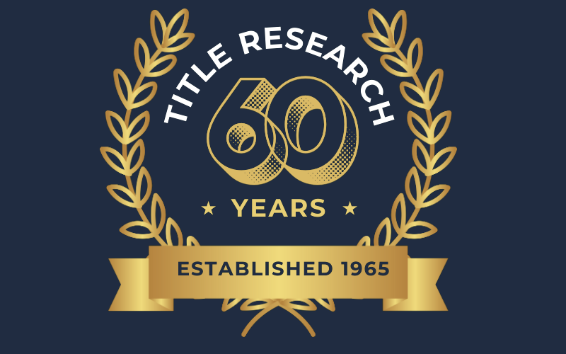 A gold and navy emblem celebrating 60 years of Title Research, established in 1965.